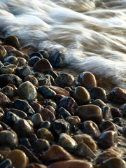 abstract backlight with beach sand and sea, wet texture