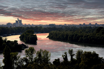 panorama city view while sunset over Belgrade, Serbia at confluence of two main rivers, Danube and...