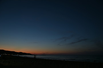 Fototapeta na wymiar Sunset on the Beach at Summer in Vieste, Puglia, Italy