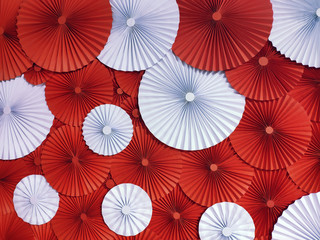 Multicolor Origami, background. Flowers made of paper. Abstract red and white background.