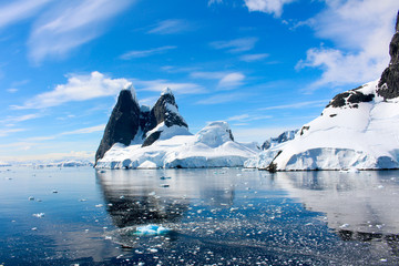Landscape of snowy mountains of the Lemaire Channel in the Antarctic Peninsula, Antarctica