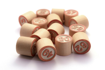 wooden lotto barrels on a white background