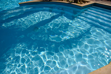 Obraz na płótnie Canvas Swimming Pool by Morning at Summer