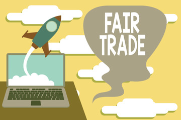 Handwriting text Fair Trade. Conceptual photo buying goods directly from producers in developing countries Successful rocket launching clouds out laptop background. Startup growing