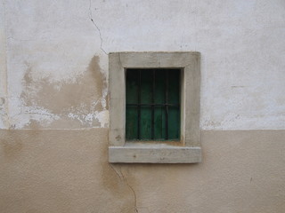 Fototapeta na wymiar Closeup of an old window in north of Spain, El Camino de Santiago, Journey from Estella to Torres del Rio, French way, Spain
