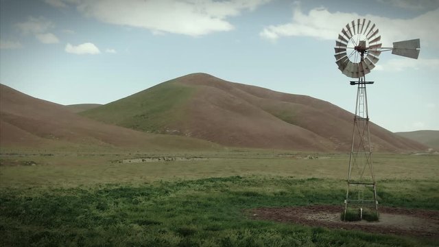 Aerial: old Windmills on a ranch in California, USA