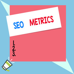 Text sign showing Seo Metrics. Business photo text measure the perforanalysisce of website for organic search results Speaking trumpet on left bottom and paper attached to rectangle background