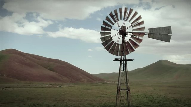 Aerial: old Windmills on a ranch in California, USA