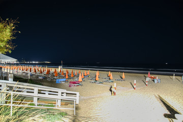 Night Beach in Vieste with Umbrellas