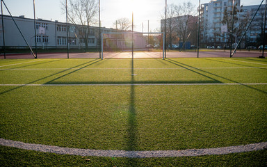 A distant shot of a goal on a football field. Classic eleven. Penalty kick.