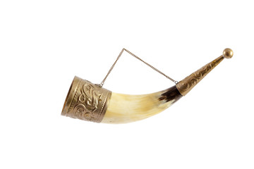 Horn for wine on chain on white background