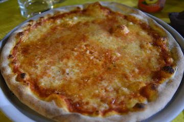 Eating Pizza at Night in the restaurant
