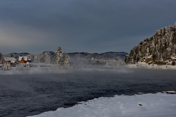 Russia. Mountain Altai, early winter morning in the village of Kebezen on the Bank of the Biya river