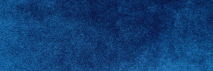 Background and texture of blue velvet fabric. Color Classic Blue. Banner...