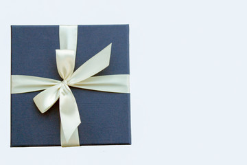  bright gift box with a white ribbon