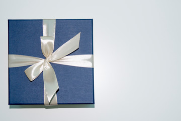  bright gift box with a white ribbon