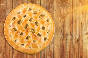 Delicious baked pie, top view on white background