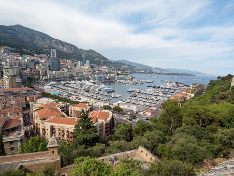 Monaco, july 2019: Panoramic view of port. Azur coast. Colorful bay with a lot of luxury yachts in sunny day