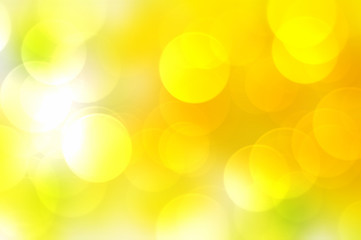 Abstract yellow background with bokeh