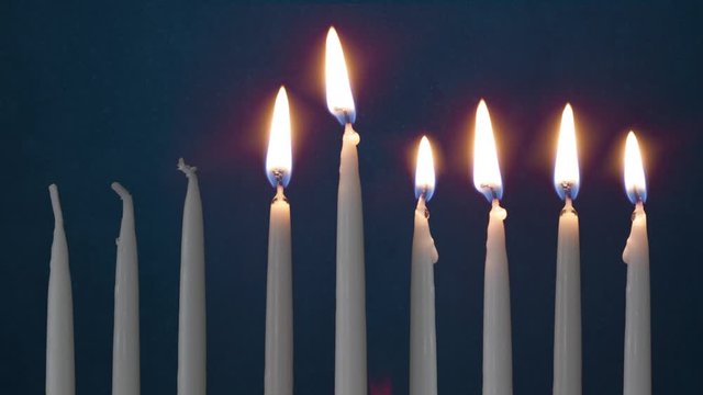 Video Of Five Lit Hanukkah Candles ON GRUNGE BACKGROUND And Shamash
