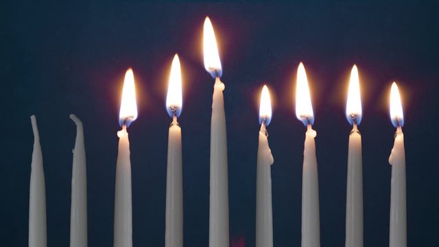 Video Of Six Lit Hanukkah Candles ON GRUNGE BACKGROUND And Shamash