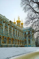 Golden domes and facade of the Catherine Palace and Church in Pushkin (Tsarskoye Selo), a suburb of...
