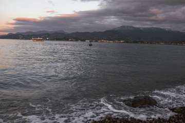 Panoramic view of the mountains and the sea in the city of Batumi. Georgia at sunset