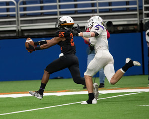 Football player in action during a game in South Texas