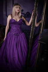 Magical night, blonde hair woman in purple evening chiffon dress