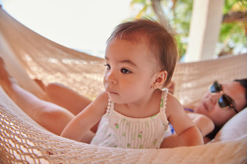Fototapeta premium Cute little girl in hammock