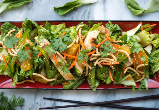 Chinese salad with grilled chicken and vegetables