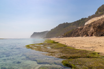 View of beautiful cliffs and sandу Melasti beach. Ungasan, South Kuta, Badung Regency, Bali