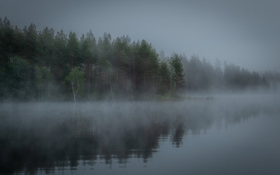 foggy lake in Finland