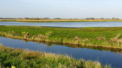 landscape with lake and blue sky