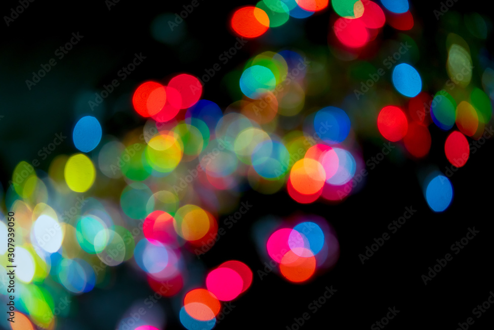 Poster festive lights blurred bokeh background real photo. design element for color spots in lightener mode