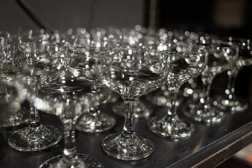 Wine and beer glass shelves in a restaurant or pub