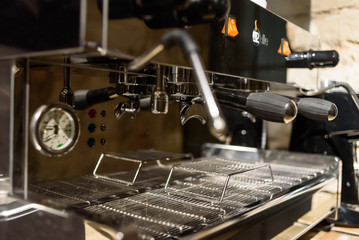 Fototapeta na wymiar Professional coffee machine with empty cups