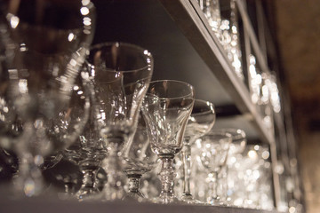 Wine and beer glass shelves in a restaurant or pub