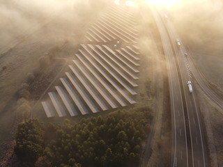 Sun rising over Solar Panels on a cloudy day in Germany	