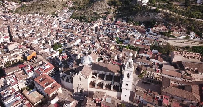 Aerial panoramic view of Xativa cityscape with Collegiate Basilica of Santa Maria, Spain
