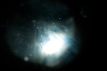 Light over black background. Easy to add overlay or screen filter over photos. Abstract sun burst...