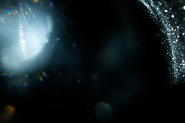 Light over black background. Easy to add overlay or screen filter over photos. Abstract sun burst...