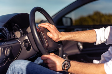 Naklejka premium Man driving car.