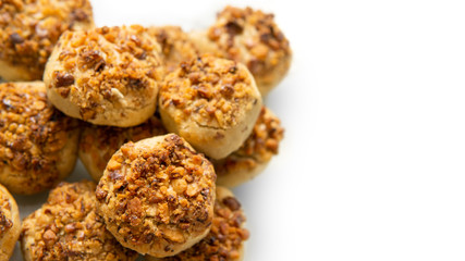 hazelnut and pecan cookies on white background