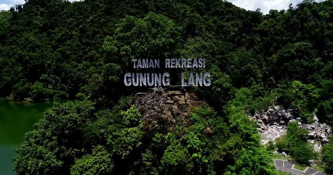Aerial view of Gunung Lang Recreational Park, located in Ipoh City, Perak, MALAYSIA. Besides the park, Gunung Lang Recreational Park has a beautiful lake and limestone hills. (111.93 hectares)