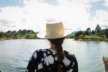 Traveling woman looking amazonas river