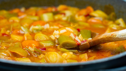 freshly cooked leek dinner in pots