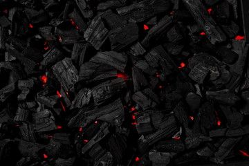 Charcoal background illuminated with red light underneath - Powered by Adobe