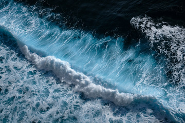 Aerial view to waves in ocean Splashing Waves. Blue turbid wavy sea water. Bali, Indonesia. - 307954807