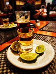 Tequila with lime and beer, shot, typical Mexican spirit